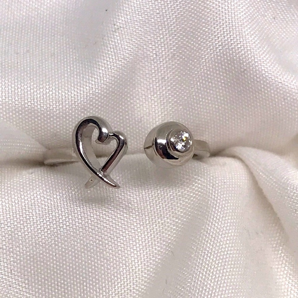 Moissanite Hugs and Kisses open band ring.
